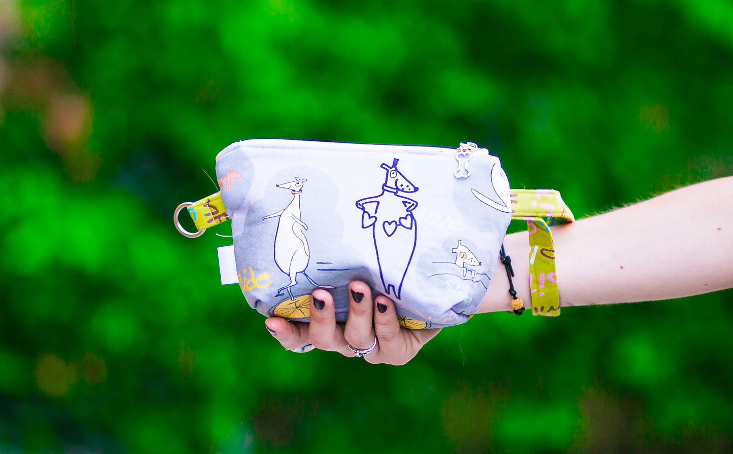 Wristlet Clutch Purse Pooch Pouch Leash Bag Paintbrush Studios Jump Ride Spin Dog in Bubbles Words Grey